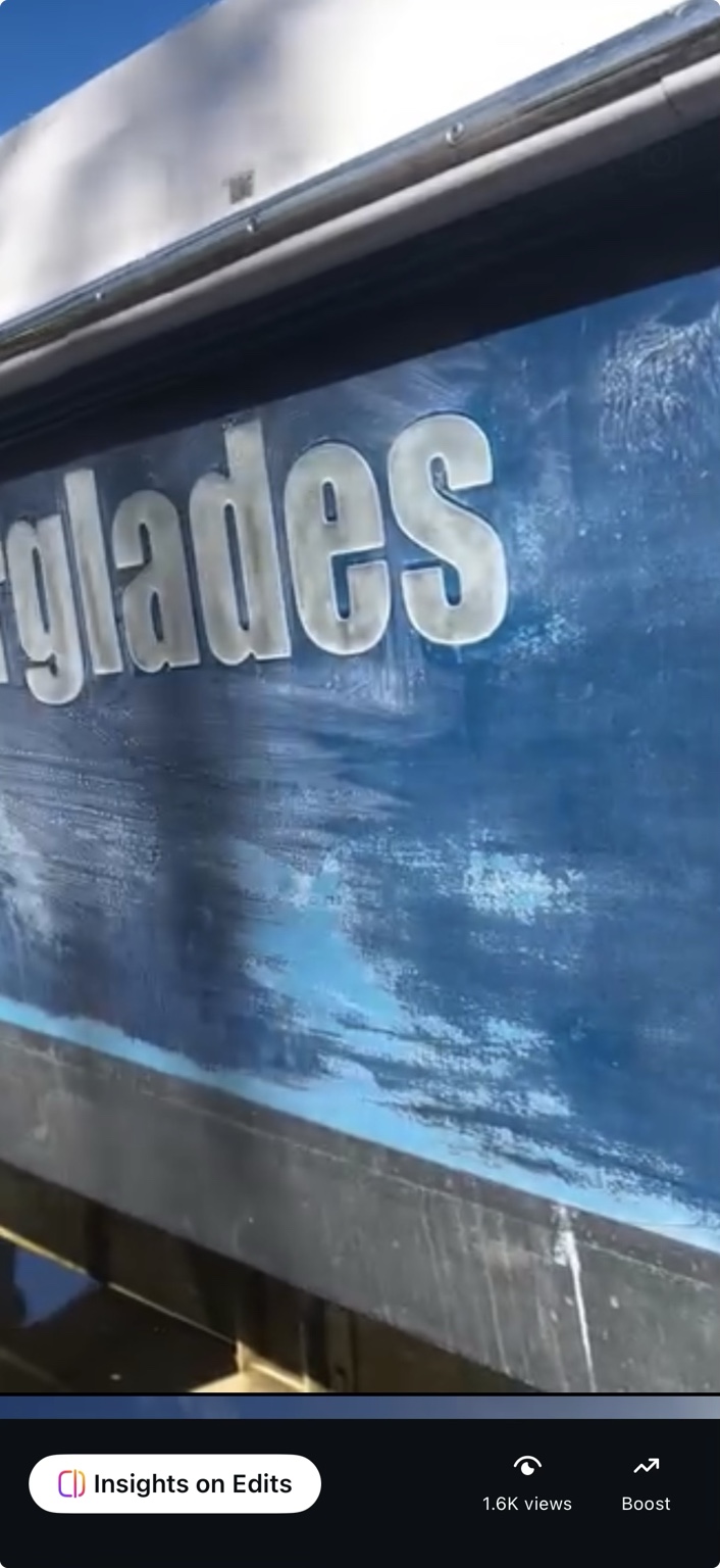 Oxidized blue Everglades hull before restoration