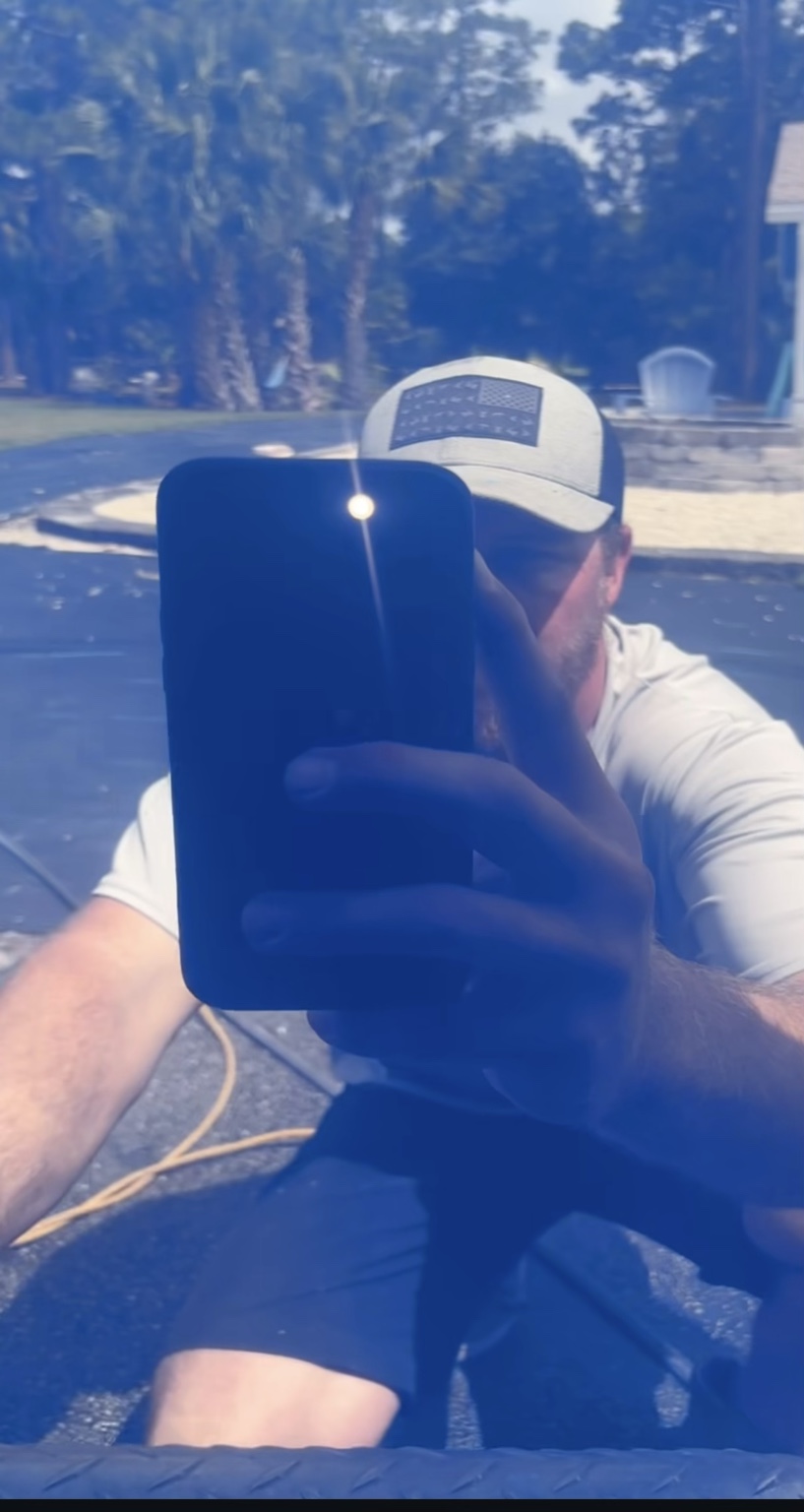 Deep blue finish reflecting Brandon after polishing