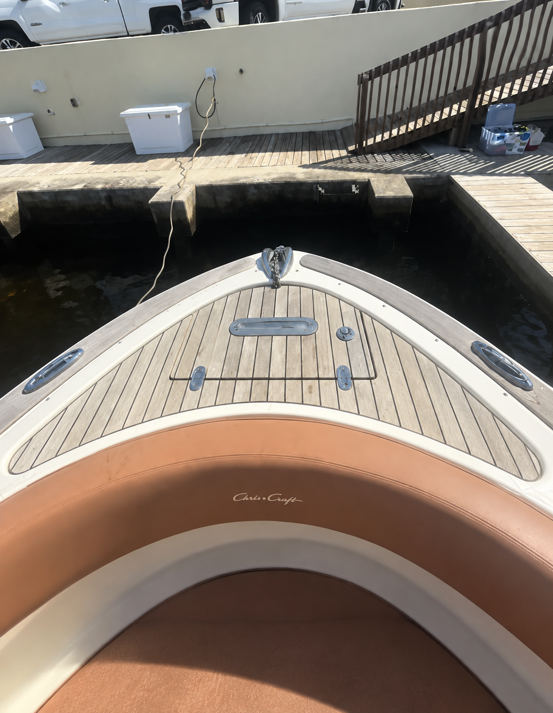 Weathered pale teak bow during preparation