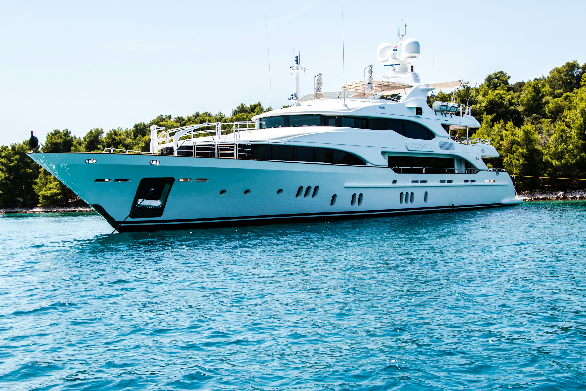 Luxury yacht on clear coastal water